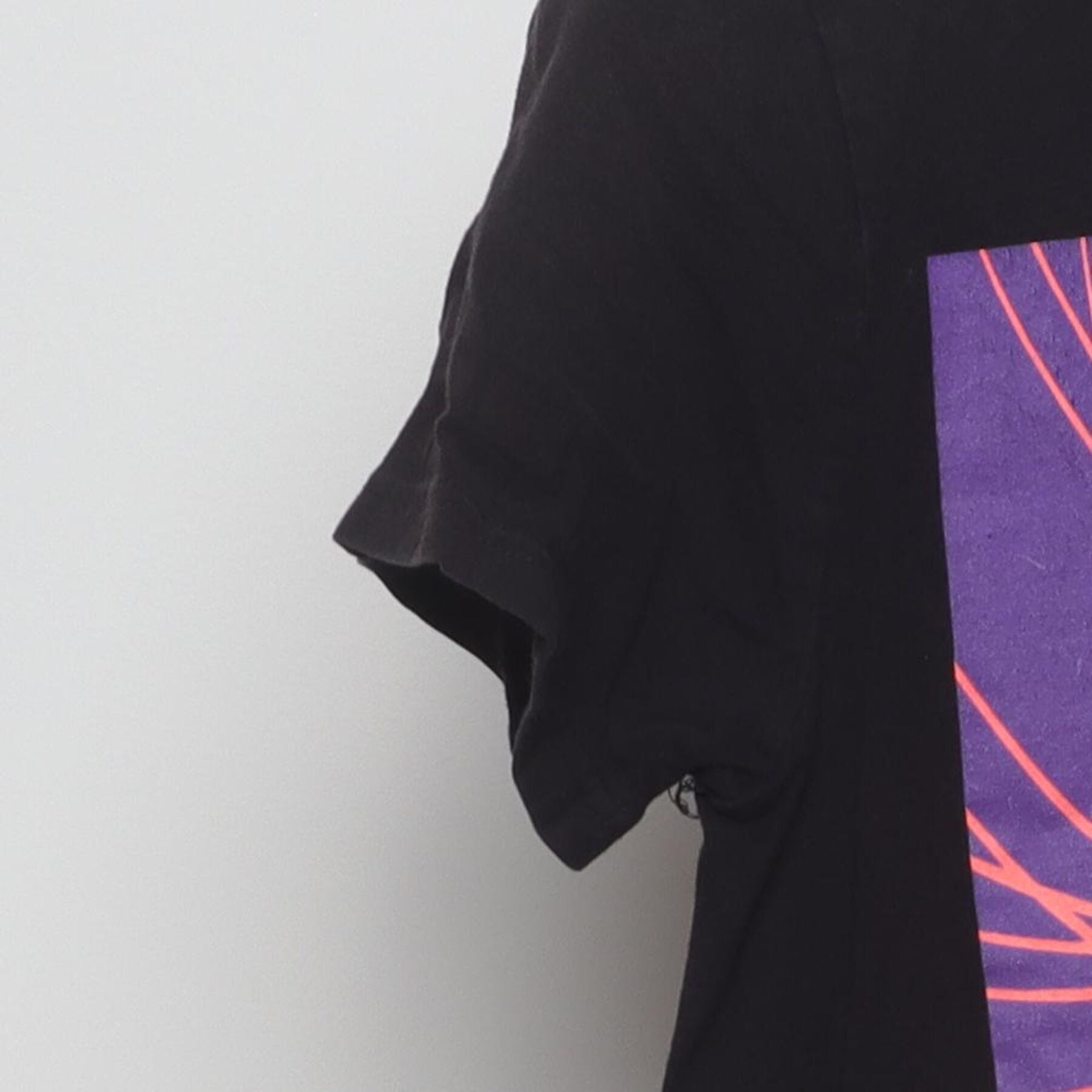 Close-up of the Left sleeve on the Vintage 2010s Tokyo Ghoul "Ken Kaneki Split" T-Shirt - S