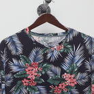 Close-up of the collar and tag on the Vintage 2010s Tropical Hawaiian Print T-Shirt L