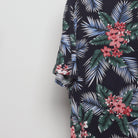 Close-up of the sleeve on the Vintage 2010s Tropical Hawaiian Print T-Shirt L