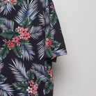 Close-up of the sleeve on the Vintage 2010s Tropical Hawaiian Print T-Shirt L