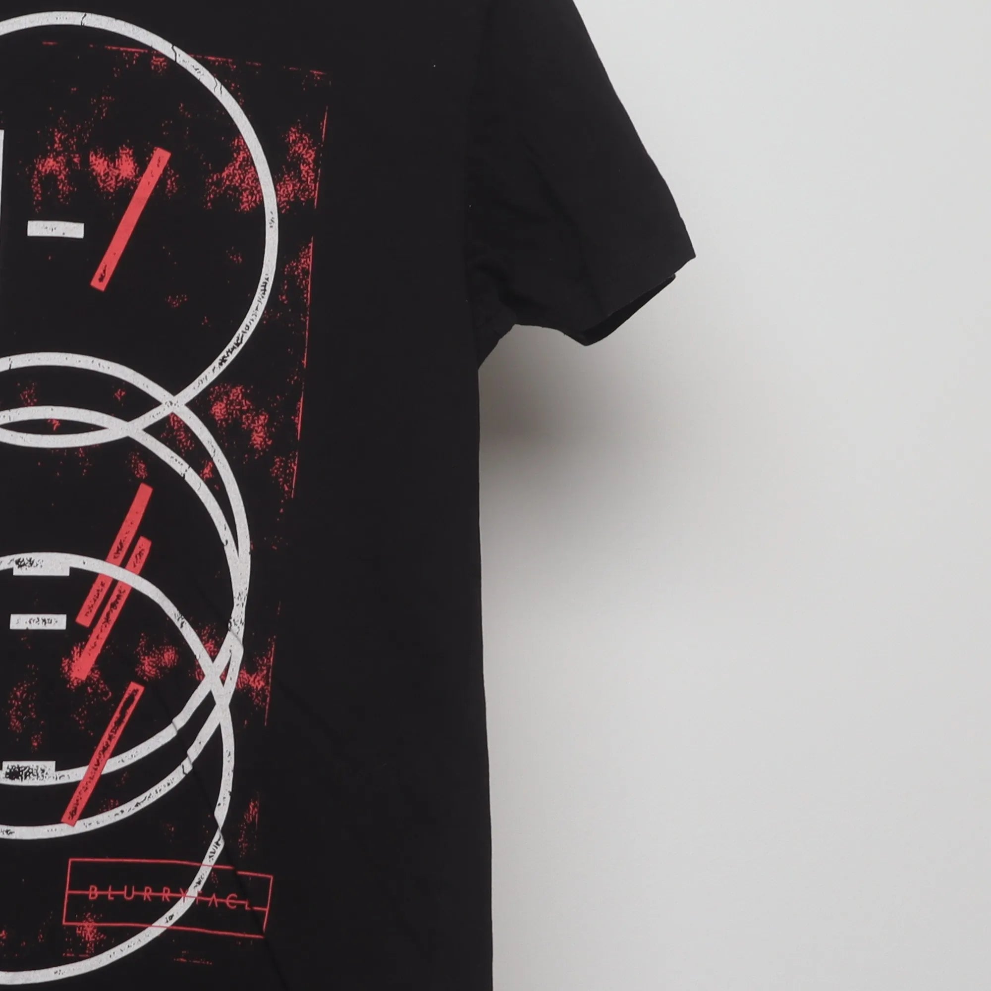 Close-up of the sleeve on the Vintage 2010s Twenty One Pilots Graphic Band Tee S