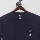 Close-up of the collar and tag on the Vintage 2010s Uniqlo Nintendo Mario Pocket T-Shirt L
