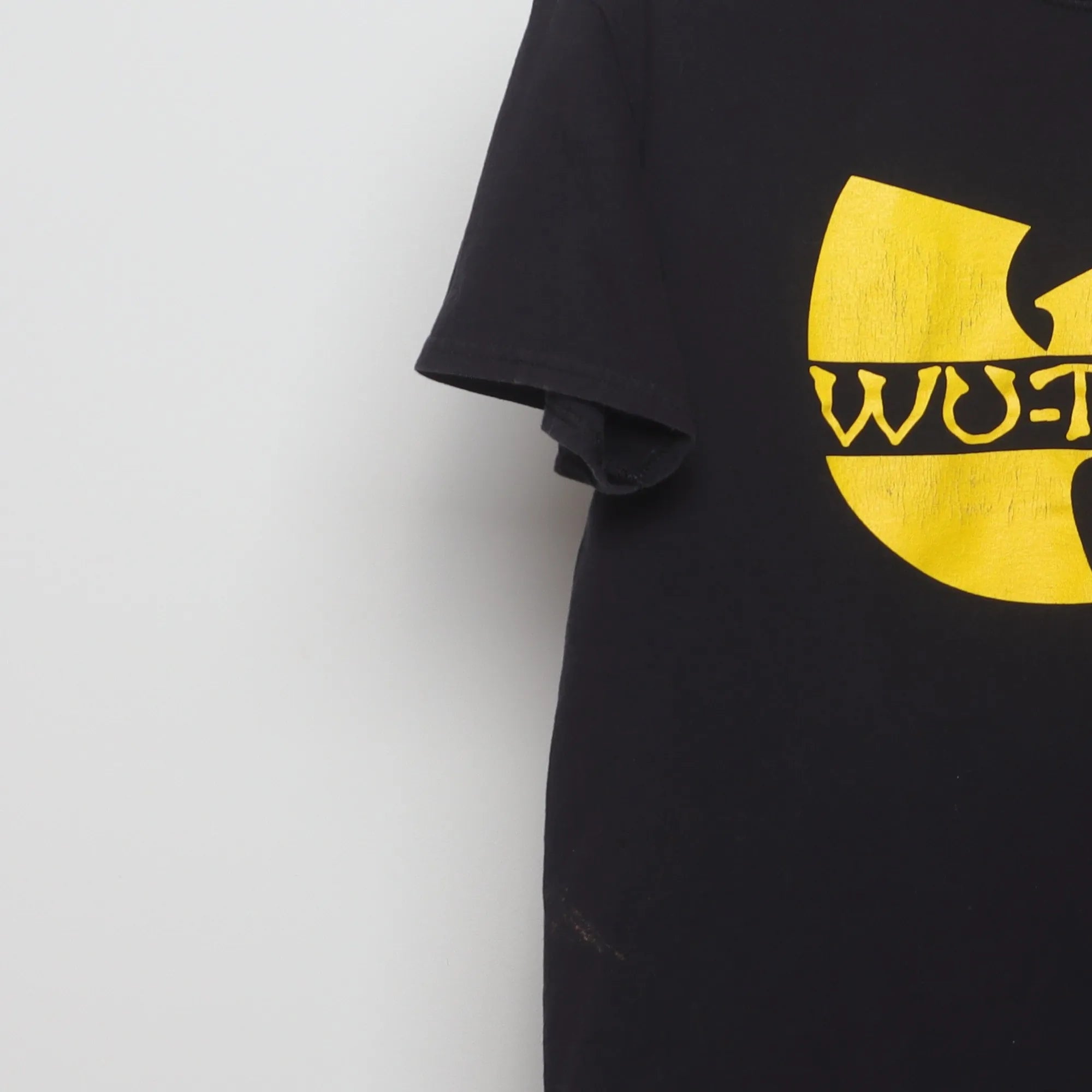 Close-up of the sleeve on the Vintage 2010s Wu-Tang Clan Classic Logo T-Shirt M