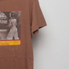 Close-up of the sleeve on the Vintage 90s Bruce Lee Soulflexin Single Stitch Tee XL