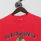 Close-up of the collar and tag on the Vintage 1990s Chicago Blackhawks "Team Logo" T-Shirt - M