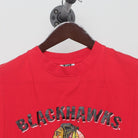 Close-up of the collar and tag on the Vintage 1990s Chicago Blackhawks "Team Logo" T-Shirt - M