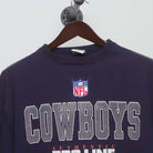 Close-up of the collar and tag on the Vintage 90s Cowboys NFL Pro Line Graphic T-Shirt XL