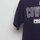 Close-up of the sleeve on the Vintage 90s Cowboys NFL Pro Line Graphic T-Shirt XL
