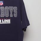 Close-up of the sleeve on the Vintage 90s Cowboys NFL Pro Line Graphic T-Shirt XL
