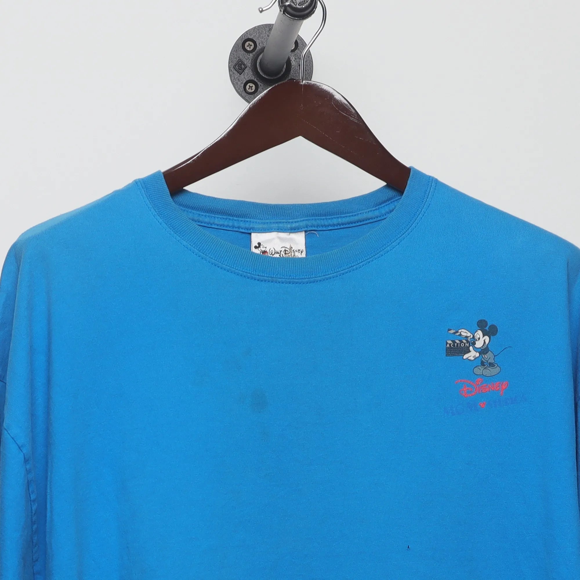 Close-up of the collar and tag on the Vintage 90s Disney MGM Studios Back Graphic Tee XL
