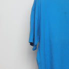 Close-up of the sleeve on the Vintage 90s Disney MGM Studios Back Graphic Tee XL