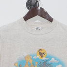 Close-up of the collar and tag on the Vintage 1990s Disney Winnie the Pooh "Pooh's Hayride" T-Shirt - S