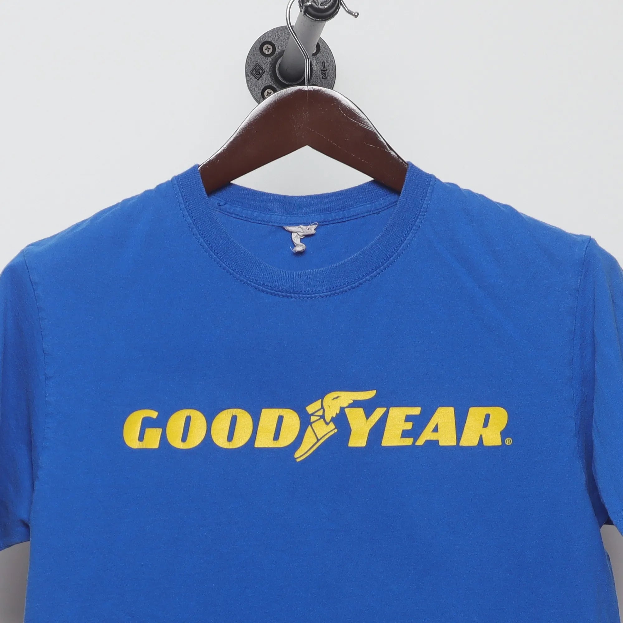 Close-up of the collar and tag on the Vintage 90s Goodyear Winged Foot Logo T-Shirt S