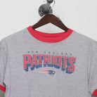 Close-up of the collar and tag on the Vintage 90s New England Patriots Ringer T-Shirt M
