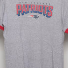 Close-up of the main graphic on the Vintage 90s New England Patriots Ringer T-Shirt M