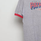 Close-up of the sleeve on the Vintage 90s New England Patriots Ringer T-Shirt M