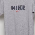 Close-up of the main graphic on the Vintage 90s Nike Block Logo Swoosh T-Shirt M