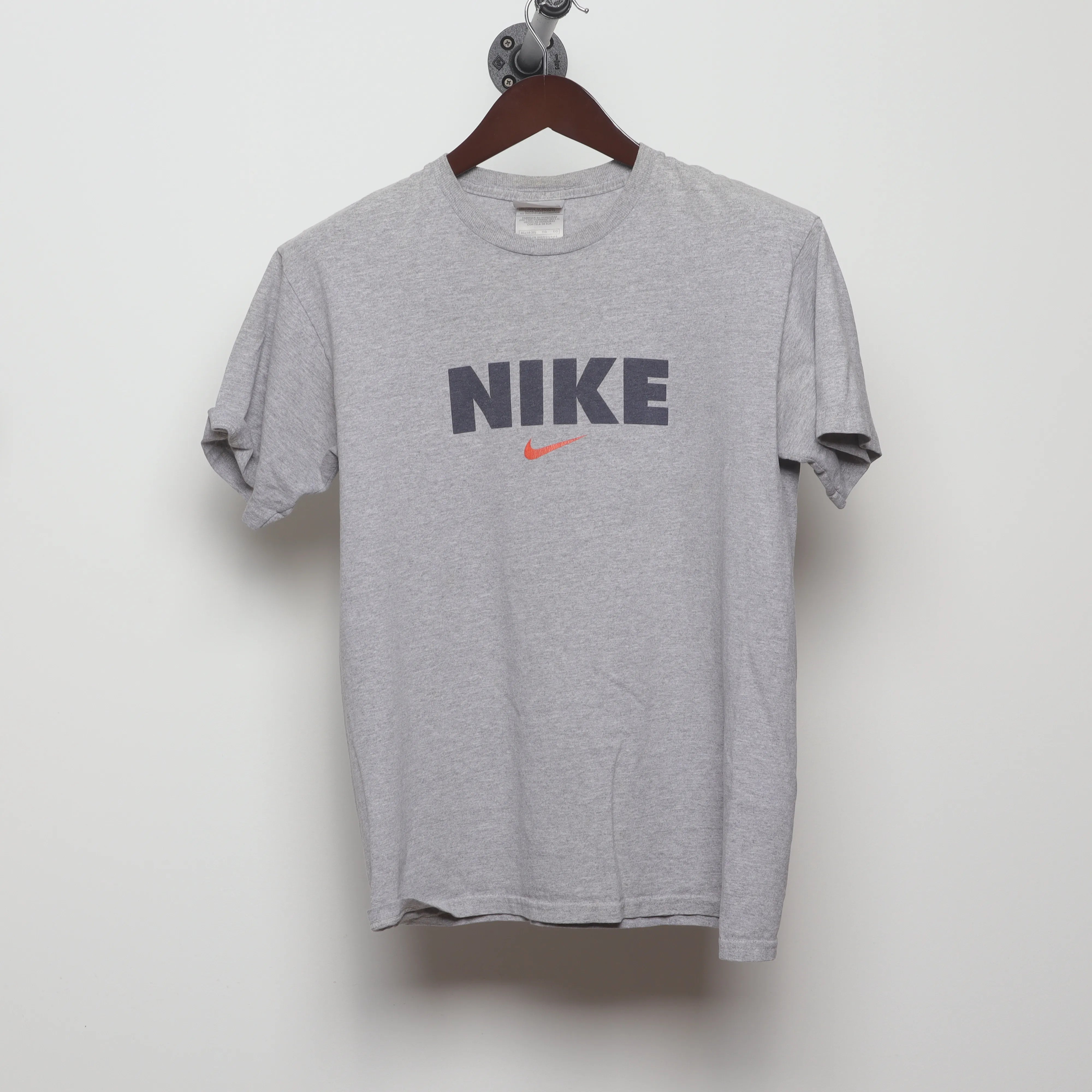 Front view of Vintage 90s Nike Block Logo Swoosh T-Shirt M