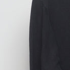 Close-up of the Left sleeve on the Vintage 1990s Nike "Jacksonville Jaguars Mock Neck" T-Shirt - M