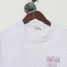 Close-up of the collar and tag on the Vintage 1990s Champion "University of Chicago Crest" T-Shirt - L