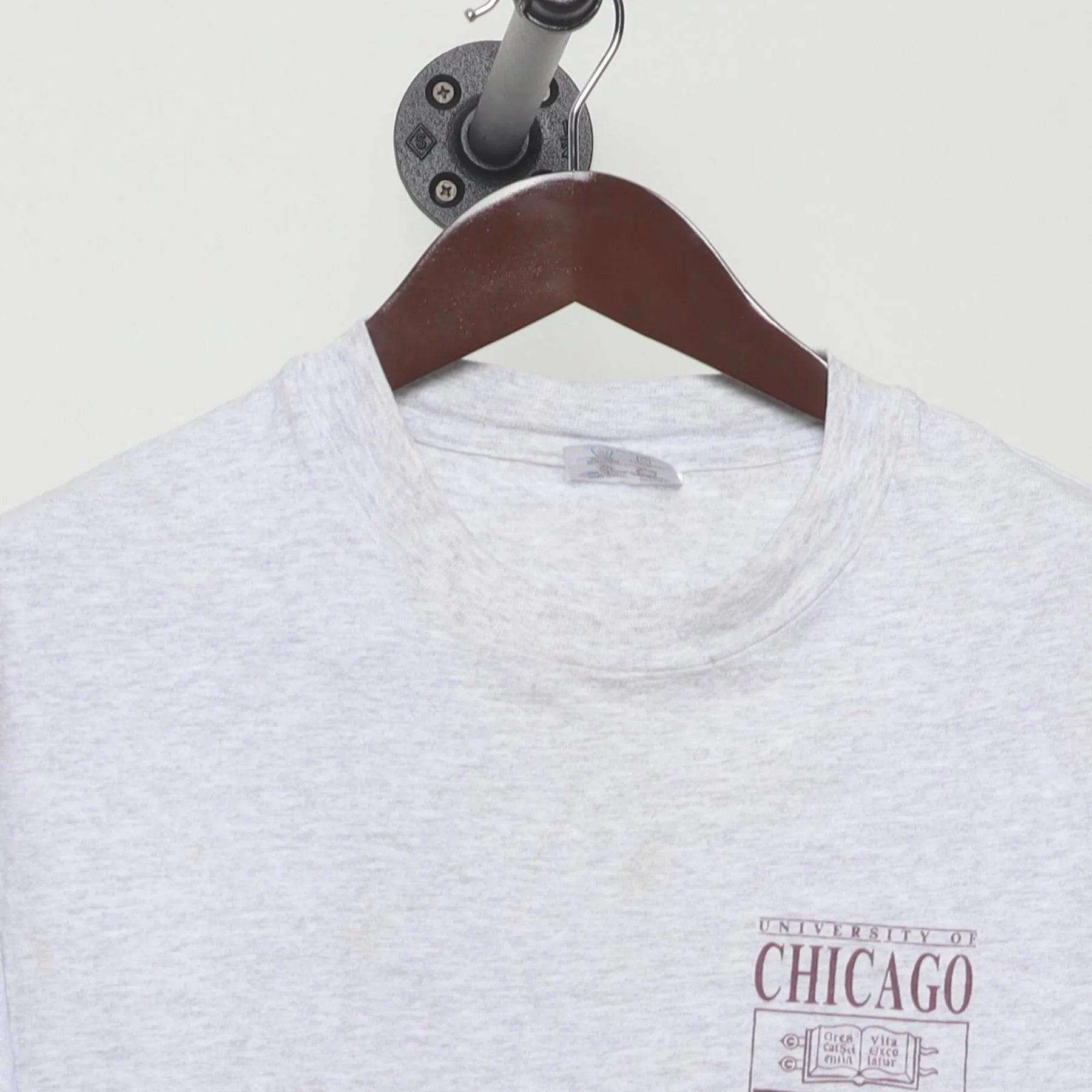 Close-up of the collar and tag on the Vintage 1990s Champion "University of Chicago Crest" T-Shirt - L