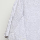 Close-up of the Left sleeve on the Vintage 1990s Champion "University of Chicago Crest" T-Shirt - L
