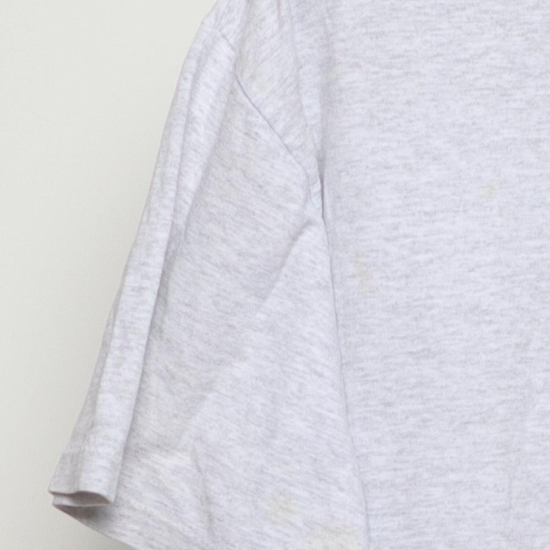 Close-up of the Left sleeve on the Vintage 1990s Champion "University of Chicago Crest" T-Shirt - L