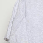 Close-up of the Left sleeve on the Vintage 1990s Champion "University of Chicago Crest" T-Shirt - L
