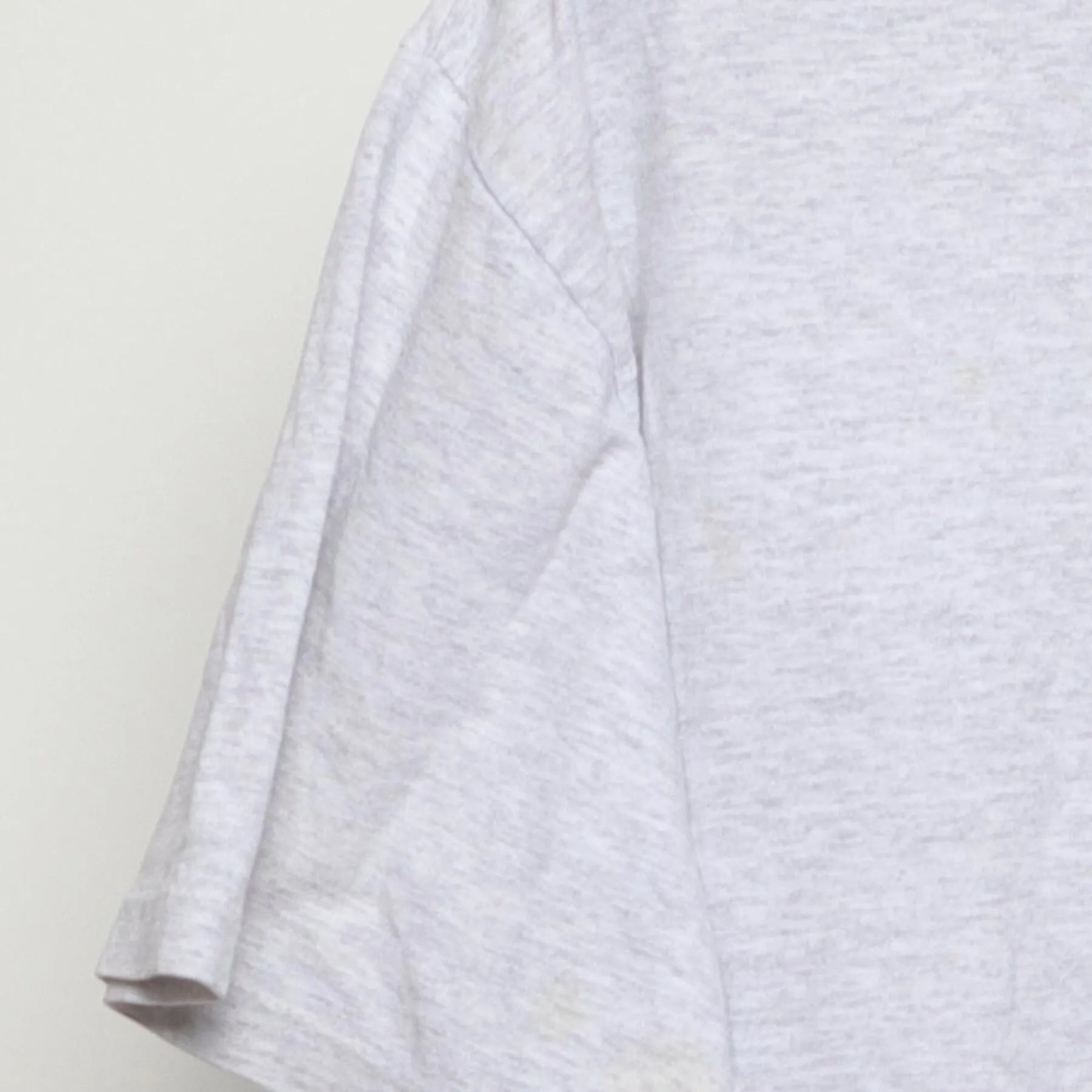 Close-up of the Left sleeve on the Vintage 1990s Champion "University of Chicago Crest" T-Shirt - L