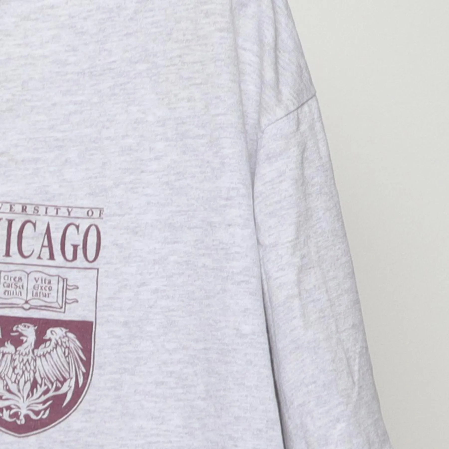 Close-up of the Right sleeve on the Vintage 1990s Champion "University of Chicago Crest" T-Shirt - L