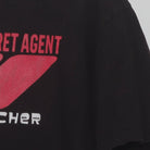 Close-up of the Right sleeve on the Vintage Y2K Archer "ISIS Secret Agent" T-Shirt - L