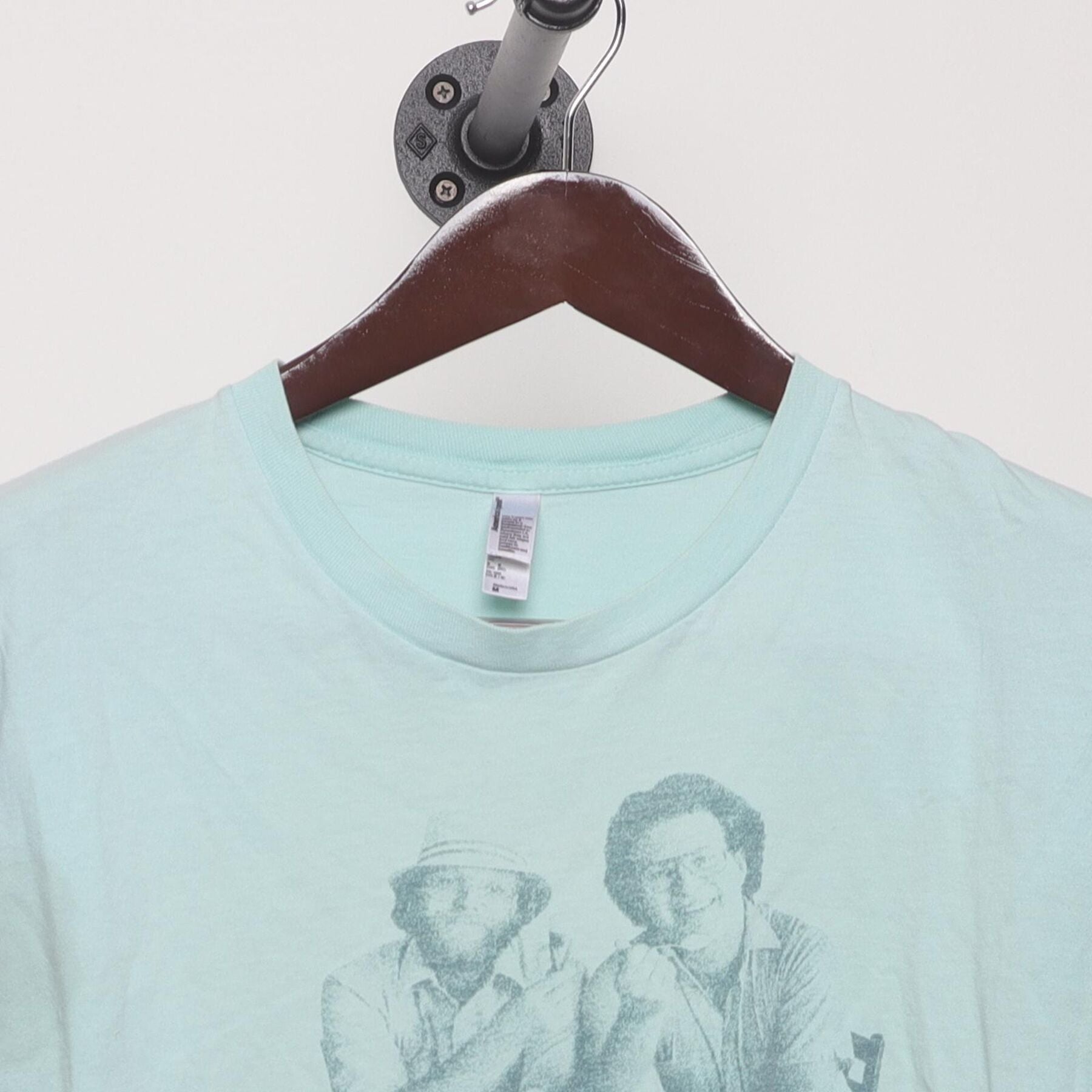 Close-up of the collar and tag on the Vintage Y2K Ben & Jerry's "Founders Portrait" T-Shirt - S
