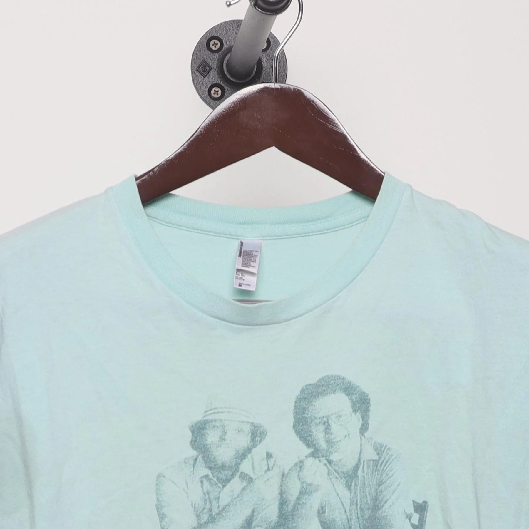 Close-up of the collar and tag on the Vintage Y2K Ben & Jerry's "Founders Portrait" T-Shirt - S