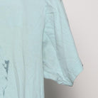 Close-up of the Right sleeve on the Vintage Y2K Ben & Jerry's "Founders Portrait" T-Shirt - S