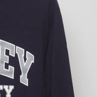 Close-up of the Right sleeve on the Vintage Y2K Champion "Bentley University" T-Shirt - S