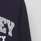 Close-up of the Right sleeve on the Vintage Y2K Champion "Bentley University" T-Shirt - S