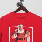 Close-up of the collar and tag on the Vintage Coca-Cola Santa Claus Graphic Tee L