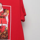 Close-up of the sleeve on the Vintage Coca-Cola Santa Claus Graphic Tee L