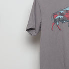 Close-up of the sleeve on the Vintage Eddie Bauer Bison Landscape Graphic Tee M