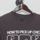 Close-up of the collar and tag on the Vintage Y2K Ripple Junction "How To Pick Up Chicks" T-Shirt - M
