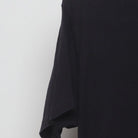 Close-up of the Left sleeve on the Vintage Y2K Howard & The White Boys "Strung Out On The Blues" T-Shirt - M