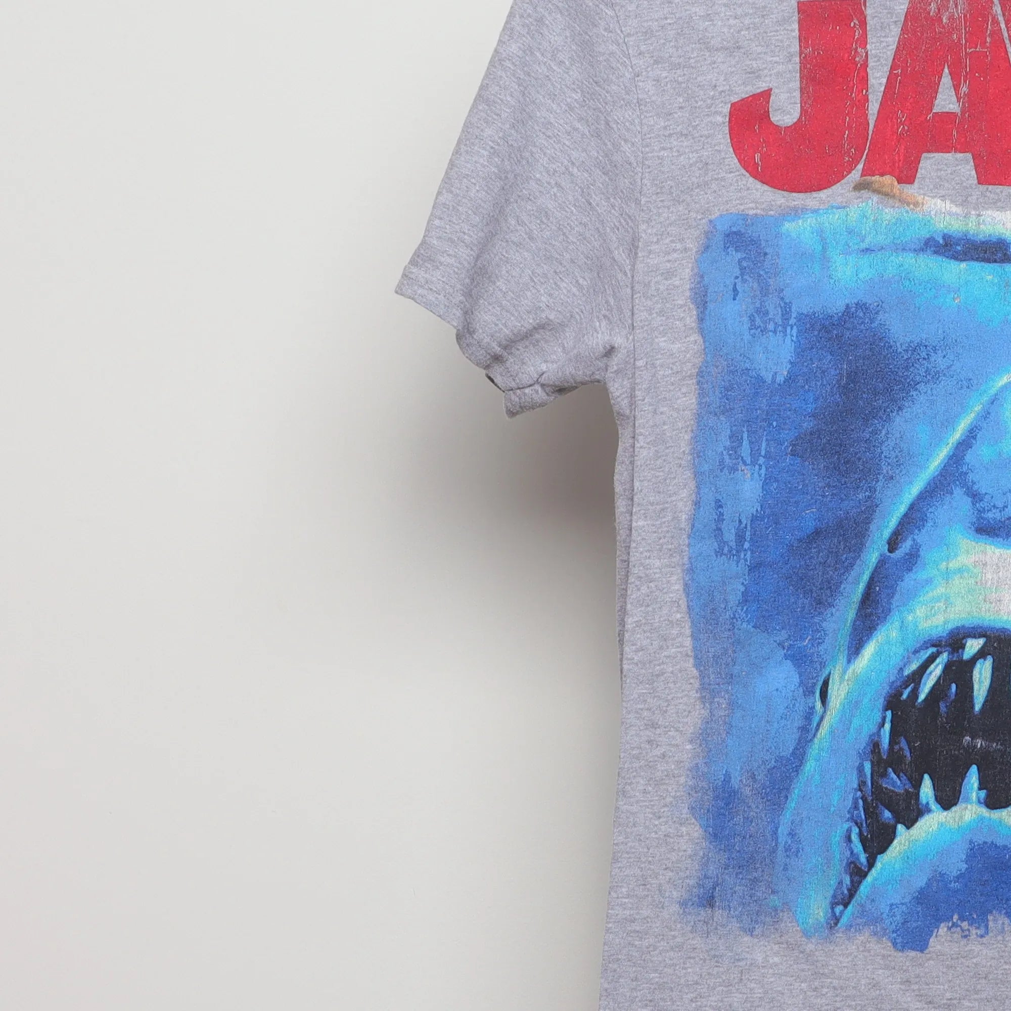 Close-up of the sleeve on the Vintage JAWS Movie Poster Graphic T-Shirt M