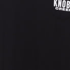 Close-up of the main graphic on the Vintage Y2K Knob Creek "Every Bit Earned" T-Shirt - XS