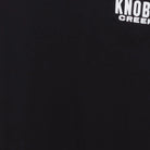 Close-up of the main graphic on the Vintage Y2K Knob Creek "Every Bit Earned" T-Shirt - XS