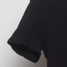 Close-up of the Left sleeve on the Vintage Y2K Knob Creek "Every Bit Earned" T-Shirt - XS