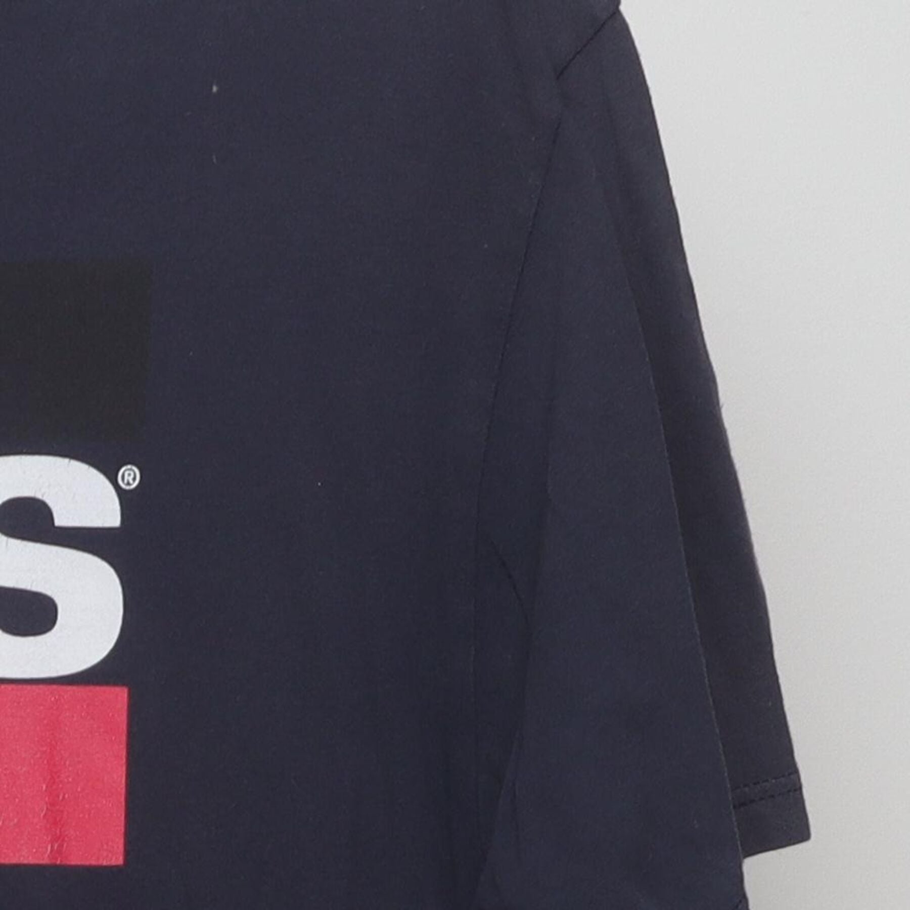 Close-up of the Right sleeve on the Vintage Y2K Levi's "Block Logo" T-Shirt - M