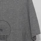 Close-up of the Right sleeve on the Vintage Y2K Live The Adventure "Bicycle Graphic" T-Shirt - M