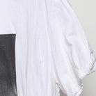 Close-up of the sleeve on the Vintage Modern 2Pac "Iconic Portrait" T-Shirt - L