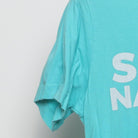 Close-up of the sleeve on the Vintage Modern Bitcoin Magazine "Satoshi Nakamoto" T-Shirt - S