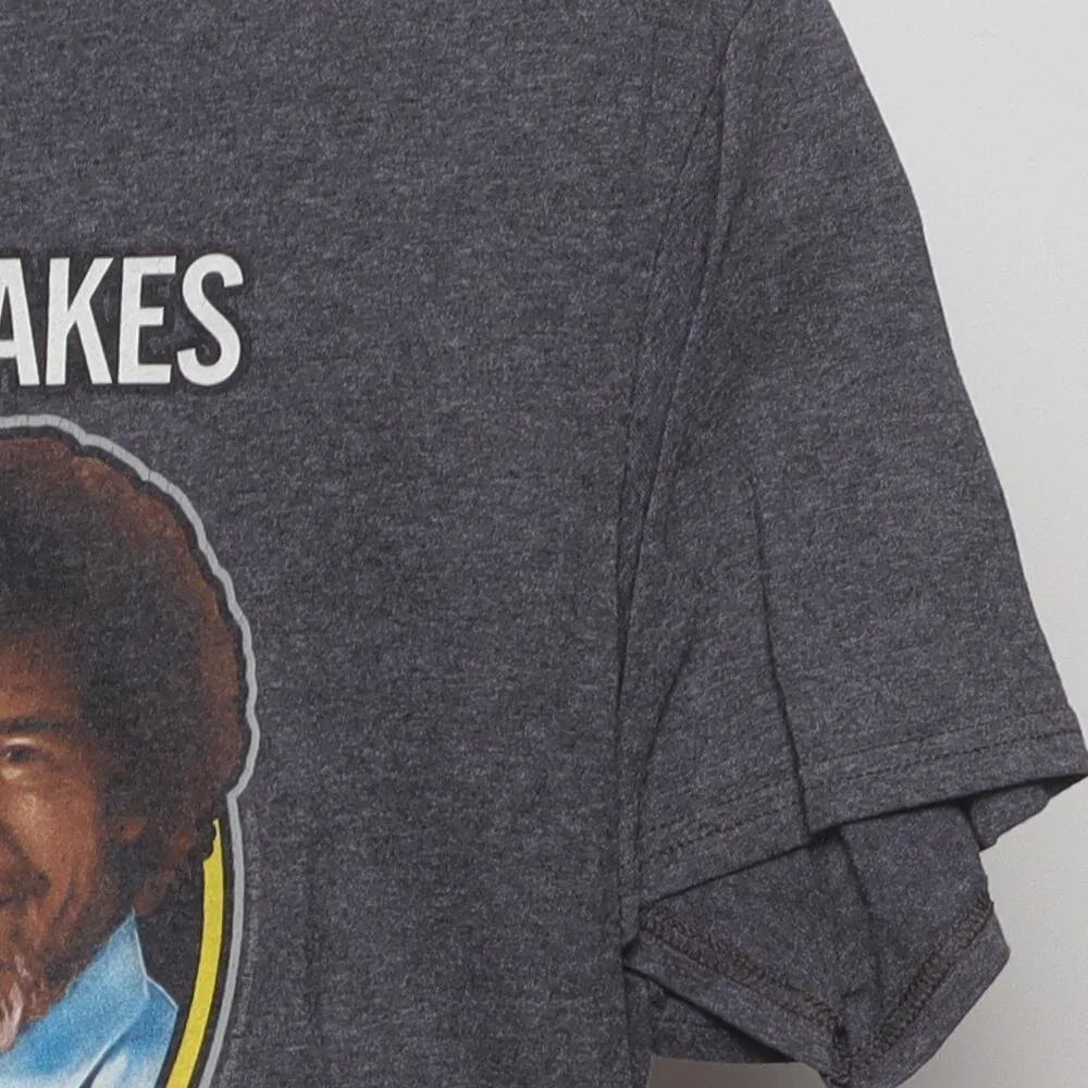Close-up of the sleeve on the Vintage Modern Bob Ross "Make Them Birds" T-Shirt - M